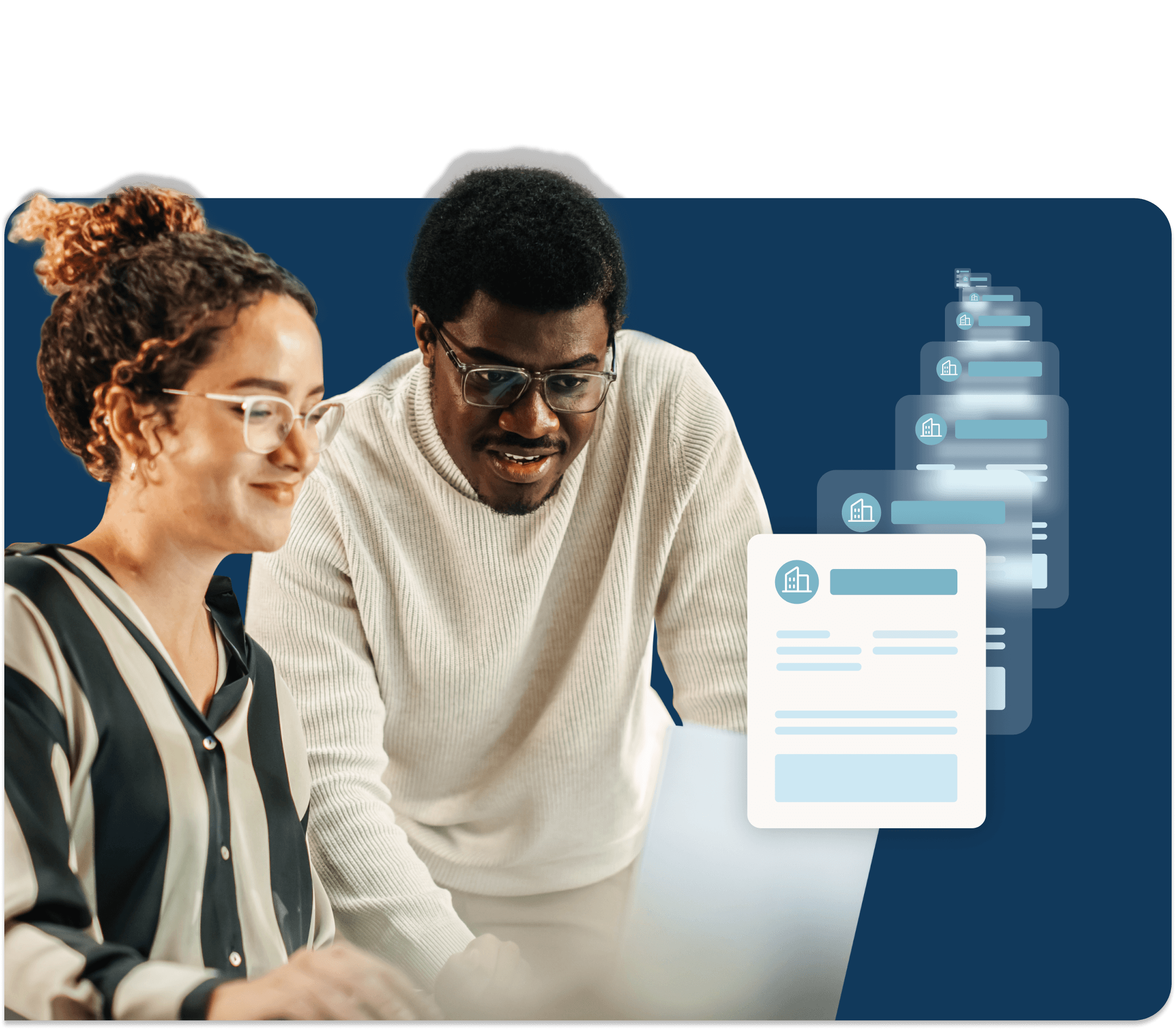 Business professionals work together at a laptop to upload numerous documents.