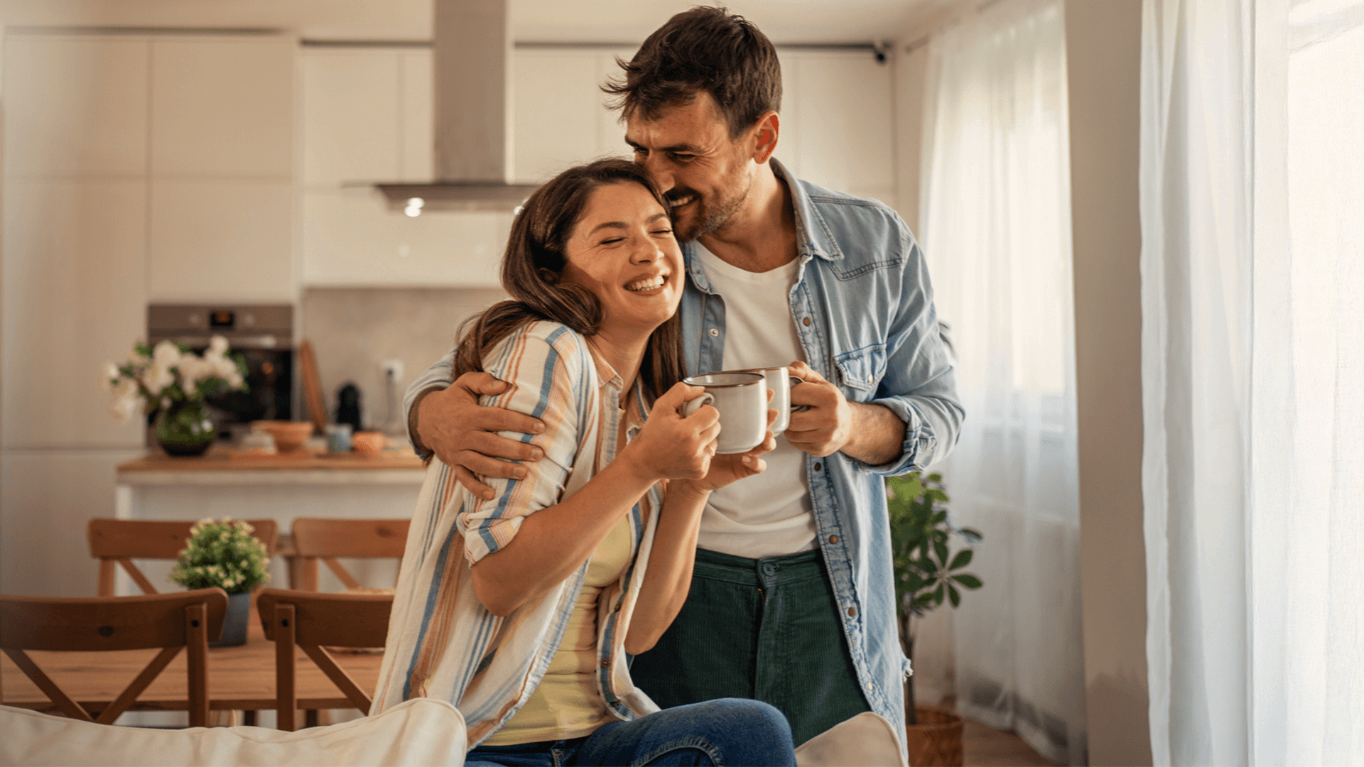 Mortgage-Couple sharing coffee at home
