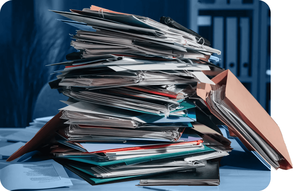 A desk full of paper files